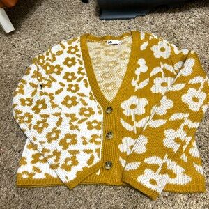 Button up V neck sweater.